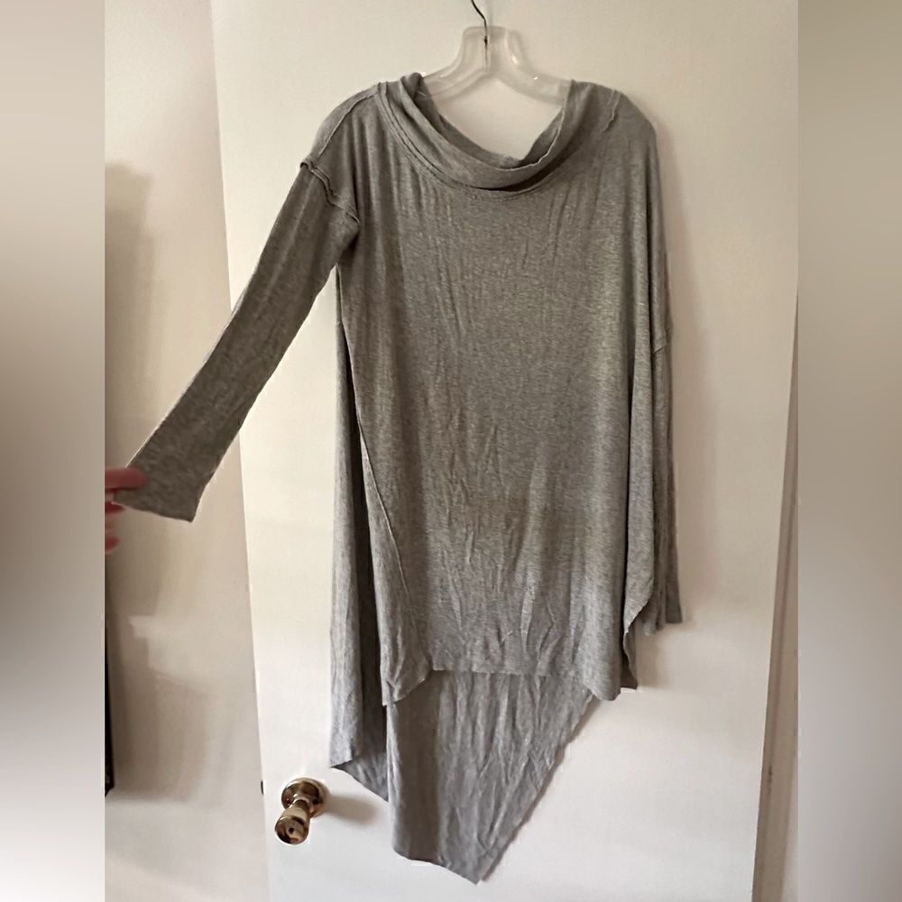 We the Free asymmetrical top in grey, Size M, loose fit.  Great condition.